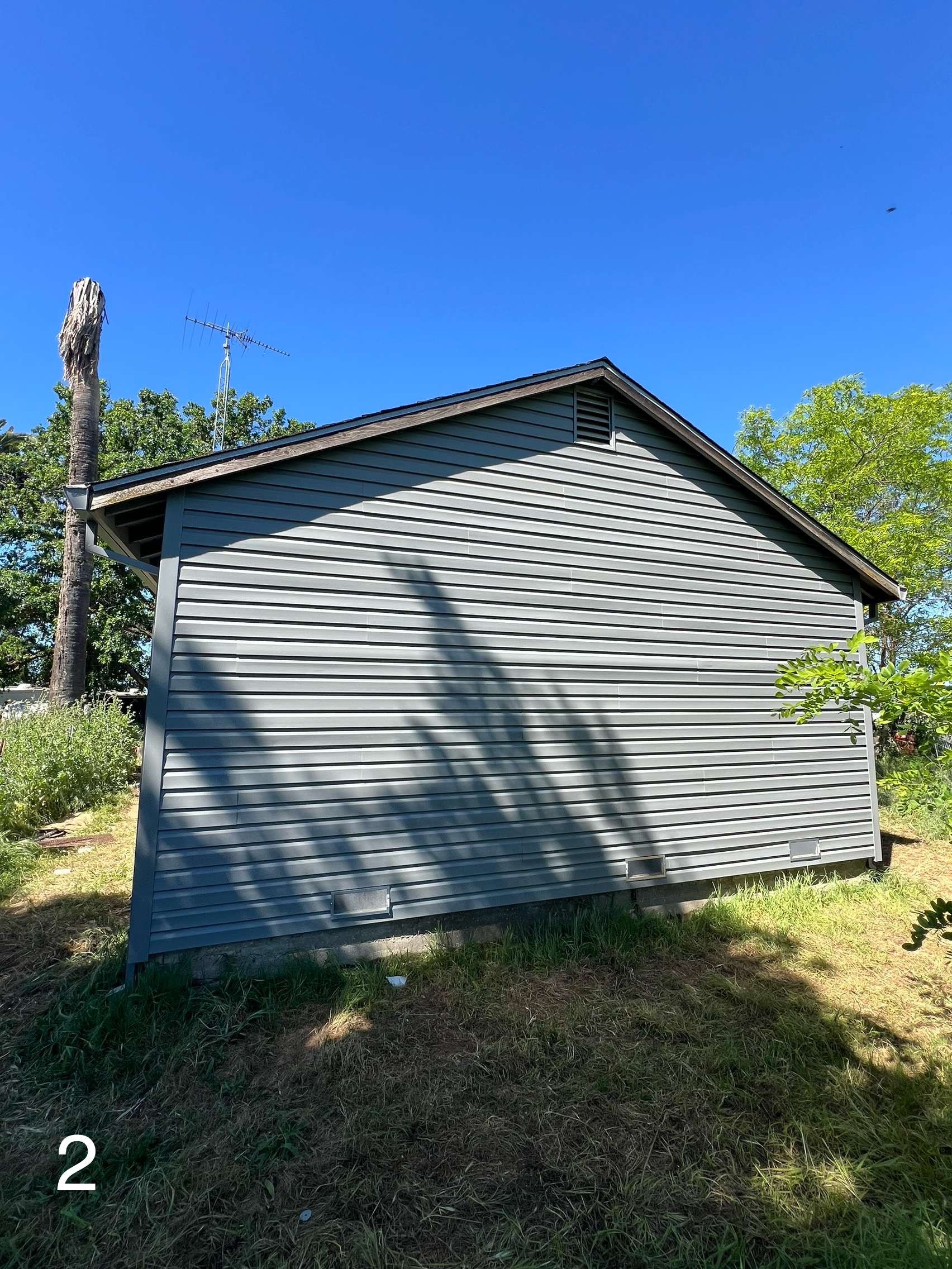 After: New vinyl siding on the rear gable of the Yuba City home